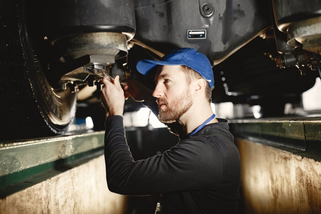 A Man Repairing the Car