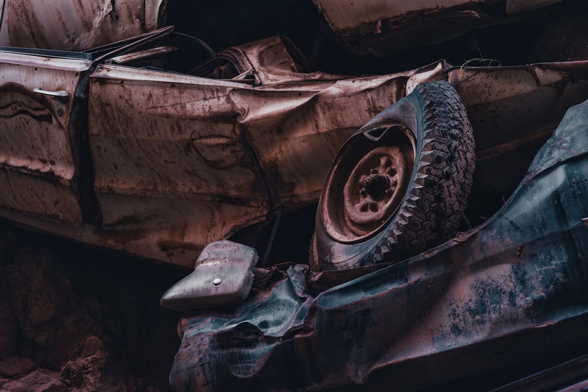 Close-up of a Pile of Abandoned, Broken Cars