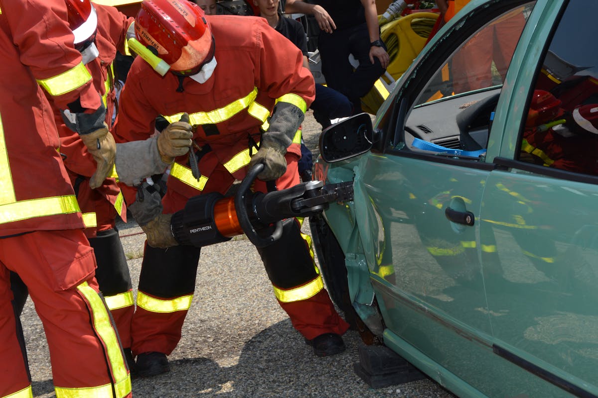 Firefighters Showing How They Open Crashed Cars